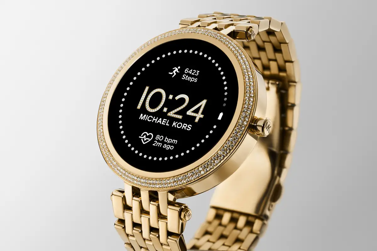 does michael kors own fossil